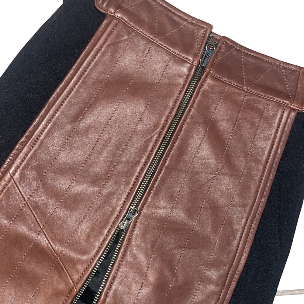 Brown leather skirt with black polyester sides. Size XS